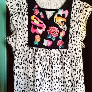 Black and white animal print tunic with bright color block in front